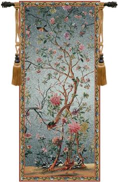 a tapestry hanging on the side of a wall with flowers and birds in it's branches