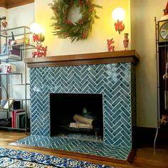 a fireplace with a wreath on top of it