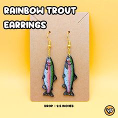 Description: Add a splash of aquatic charm to your style with these unique handmade earrings featuring the stunning rainbow trout design. Each earring is meticulously crafted using high-quality shrink plastic, resulting in lightweight and durable pieces of fish-lover jewelry. These earrings are perfect for fish enthusiasts, anglers, and anyone who appreciates the beauty of marine life. The intricate details and vibrant colors capture the essence of the rainbow trout, making them a captivating ac Shrink Plastic Earrings, Rainbow Trout Fishing, Trout Fish, Earring Inspo, Fish Earrings, Unique Handmade Earrings, Lover Jewelry, Shrinky Dink, Plastic Earrings