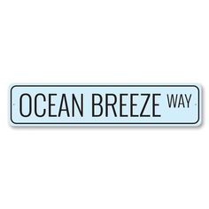 an ocean breeze way sign on a white background