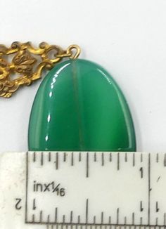 "Vintage gold tone and large green agate necklace ( A ), In good vintage condition. Necklace 18\" long, 2\" Extended. Green agate 1\"3/8 x 7/8 and 5 mm thick. 1\" ¼ x 7/8\" and 5 mm thick. Weighs 1.1 Oz. Thanks." Formal Gold Jade Necklaces, Formal Gold Jade Necklace, Vintage Green Jewelry With Large Stone, Vintage Adjustable Jade Necklace, Vintage Adjustable Jade Necklaces, Adjustable Vintage Jade Necklace, Adjustable Vintage Jade Necklaces, Green Oval Necklace For Formal Occasions, Formal Green Oval Necklace