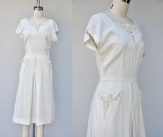 Vintage Off White Dress - Cocktail - Wedding Party Vintage Dress  * Squared Neck area with Floral applique   *Pockets with same applique  * Zip on side  * Slightly Sheer - will need a slip  * Not Lined    Excellent Vintage Condition  Measurement approximately : Label : N/A Size: N/A - Feels like XS but please refer to the measurements provided to ensure best fit. Dress form is size 2 for reference. Fabric: N/A feels like cotton or cotton blend  Color : Off White / Ivory  From one sleeve end to o Mid Century Wedding, Halloween Wedding Invitations, Off White Dress, January 2nd, Wedding Cocktail Party, Dresses 40s, Shearling Vest, Off White Dresses