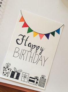 a happy birthday card with presents on it and the words happy birthday written in black ink