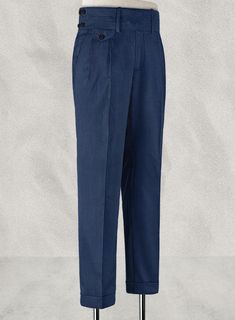 Crafted from a  wool blend , the Napolean Persian Blue Double Gurkha Wool Trousers offer an effortless route to tailored finesse that is sure to live in your tailoring collection for years to come. 
 
 Look Includes  Napolean Persian Blue Wool Fabric  Cross Pocket  Two Pleated Front  Double Button Fastening Wide Waistband  Diamond Pocket On Right  1.5inch Trouser Cuffs  Two Welted Back Pockets on Trousers   You can change the look during customization if required. 
 
 Lining: Viscose, Dry Clean, Formal Blue Wool Bottoms, Blue Wool Bottoms With Welt Pockets, Elegant Blue Wool Bottoms, Tailored Blue Wool Bottoms, Tailored Wool Blue Bottoms, Full Length Wool Suits For Tailoring, Blue Wool Dress Pants For Work, Fitted Wool Blue Dress Pants, Fitted Blue Wool Dress Pants