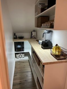 the kitchen is clean and ready to be used as a work space for someone's office