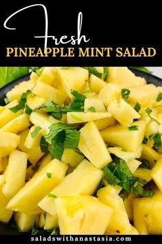 fresh pineapple mint salad on a black plate with text overlay that reads fresh pineapple mint salad