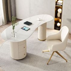 a white table with a phone on it and a chair next to it in front of a bookshelf