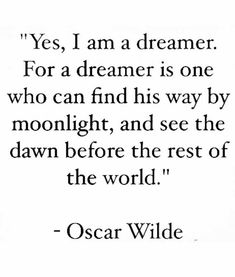 oscar wilde quote about dreaming and the rest of the world on white paper with black ink