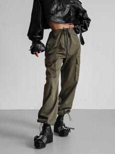 Chic and trendy utility design cargo pants made in nylon with drawstring waist for super comfortable fit. Drawstring at ankle to cuff pant as well. Pocket details. Model is in MINUSEY S. ✔️ Free worldwide express shipping over $100✔️ Loved by 6,500+ customers✔️ Limited edition collections, maximum style⠀⠀⠀⠀⠀⠀⠀⠀⠀Stay ahead of the trend with can’t-find-anywhere-else staples. Your closet will thank you 💕 * MINUSEY S = EU 34, US 2* MINUSEY M = EU 36, US 4* 100% Nylon* Dry clean* Made in Korea - Model Height: 169cm/5'6" (US2, EU34) Techwear Parachute Pants With Cargo Pockets, Techwear Parachute Trousers With Cargo Pockets, Combat Style Nylon Cargo Pants With Pockets, Khaki Utility Cargo Jeans With Elastic Waistband, Utility Parachute Pants With Multiple Pockets For Streetwear, Utility Cargo Pants With Elastic Waistband In Khaki, Utility Nylon Pants With Functional Drawstring, Utility Khaki Cargo Pants With Elastic Waistband, Fall Techwear Parachute Pants With Pockets