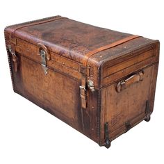 an old brown leather suitcase is shown on a white background