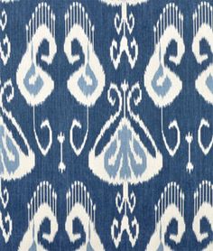 a blue and white pattern on fabric