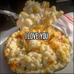 a white plate topped with macaroni and cheese