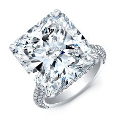 a cushion cut diamond ring with pave set shoulders