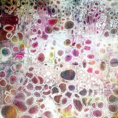 an abstract painting with lots of circles on it