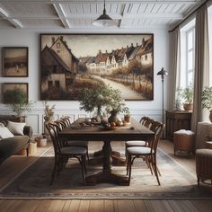 a dining room with a painting on the wall