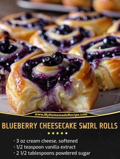 blueberry cheesecake swirl rolls on a white plate