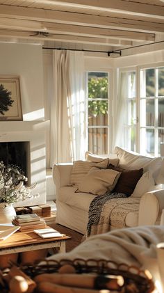 a living room filled with furniture and a fire place