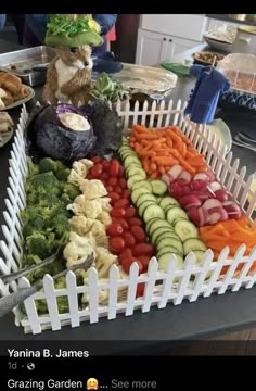 a table filled with lots of different types of vegetables and breads on top of it