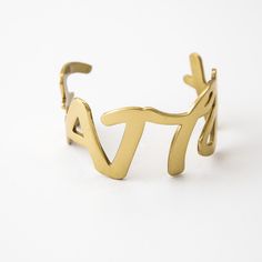 This new and uniquely designed cuff appears to be a geometric design, however designer Jill Donovan has taken meaningful script words and transformed them into arm art. Arm Art, Script Words, Sling Backs, Geometric Design