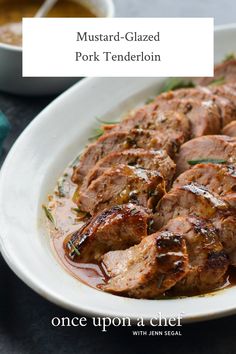 pork tenderloin on a white plate with sauce