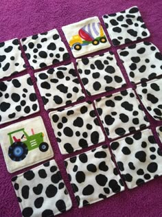 the squares are decorated with black and white polka dots, which have tractors on them