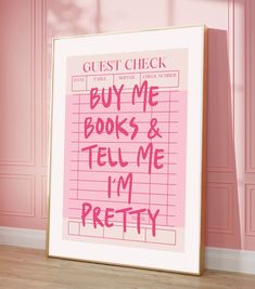 a pink poster with the words buy me books and tell me i'm pretty