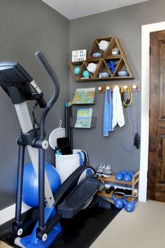 a home gym with exercise equipment and accessories