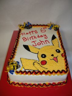 a birthday cake with a pikachu design on it