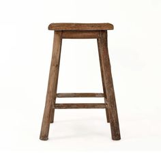 an old wooden stool is shown against a white background with the seat up and down