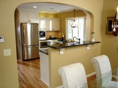 the kitchen is clean and ready to be used as a dining room or family room