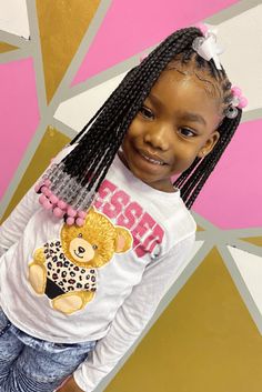 This cute crochet hairstyle for kids showcases long, straight braids with a lovely ombre effect, transitioning from a natural black to a subtle grey at the ends, adding a playful twist to the classic look. The braids are neatly parted and adorned with colorful beads and an adorable bow at the top, bringing a whimsical - Click to see more of Fun and Creative Crochet Styles for Kids: 21 Ideas to Get Inspired and follow us for more hairstyle ideas. // Photo Credit: Instagram @kidsbraidsby_kryssy Straight Braids, Hairstyle For Kids