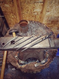 tools are sitting on top of a piece of wood