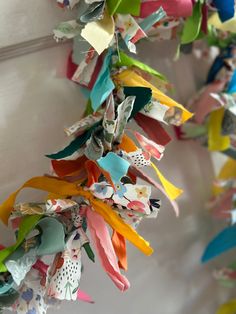 multicolored paper streamers hanging from the ceiling