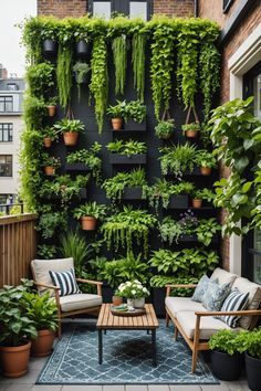 an outdoor living area with potted plants on the wall