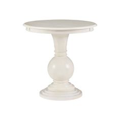 a white table with a round top on a white background in the shape of a ball