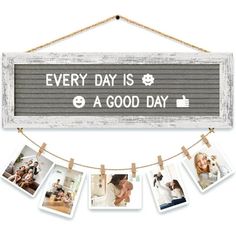 a sign that says every day is a good day with photos hanging from clothes pins