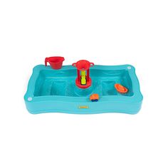 an inflatable sand and water play table with toys on it's tray