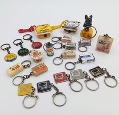 a bunch of key chains that are sitting on a table