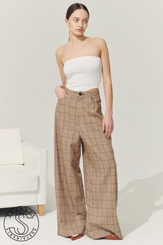 Shop Re:born Mya Wide Leg Pants in Plaid at storets. Buy Now Or Cry Later. Shop skirts, skorts, shorts, pants, jeans, leggings and more at storets. Style your look with the trendiest bottoms we have at storets. Styling Wide Leg Pants, Plaid Pant, Trendy Bottoms, Protect Nature, Baggy Sweatpants, Year One, Plaid Pants, Straight Leg Pants, Bottoms Pants