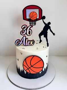 a birthday cake with a basketball and hoop on top