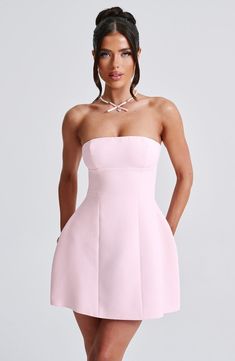 Simple and seriously chic. the Asha mini is this season's obsession. Perfect to wear for date nights. late nights and beyond. this strapless design is finished with seam details and a bubble shape skirt for extra volume.  Colour: Blush. Premium non-stretch crepe. Fully lined. Strapless. Hugs the figure. Seam details. Bubble shape skirt. Invisible zip fastening. Mini length. Model is an XS and is wearing an XS. Homecoming Dresses Corset, Midi Dress Wedding Guest, Dresses Flowy, Maxi Dress Sale, Date Nights, Sparkle Dress, Grad Dresses, Stretch Crepe, Dresses By Length