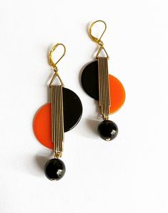 A stunning & unique pair of vintage art deco style earringsfantastic geometric shapeGold tone metal with lovely rich Black  & Orange Tango  phenolic Bakelite with two Czech Glass  drops - look great on ! Earrings are handmade and reworked using true vintage 1930s Bakelite & galalith from my large collection. Each pair of earrings are unique and I will only make limited pairs in each design due to the rarity of vintage Bakelite.after the style of jakob bengel and similiar European Mod Art Deco Earrings Vintage, Deco Earrings, Modernist Jewelry, Orange Earrings, Vintage Bakelite, Earrings Geometric, Art Deco Earrings, Vintage Orange, Earrings Vintage