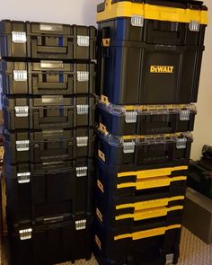 several black and yellow boxes stacked on top of each other