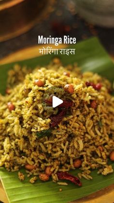 a plate full of rice and beans on top of a banana leaf with the words morning rice written in english