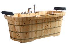 a wooden bathtub with two faucets on it