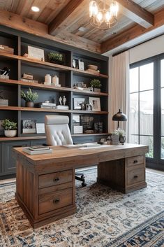 a home office with built - in shelving and desk