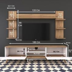 an entertainment center is shown with measurements for the wall mounted tv and shelving unit