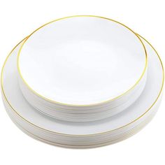 white and gold dinner plates stacked on top of each other