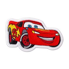 the disney cars character is smiling with his eyes wide open, and he's in red