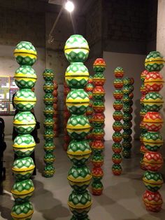 an art exhibit with many colorful balls on display